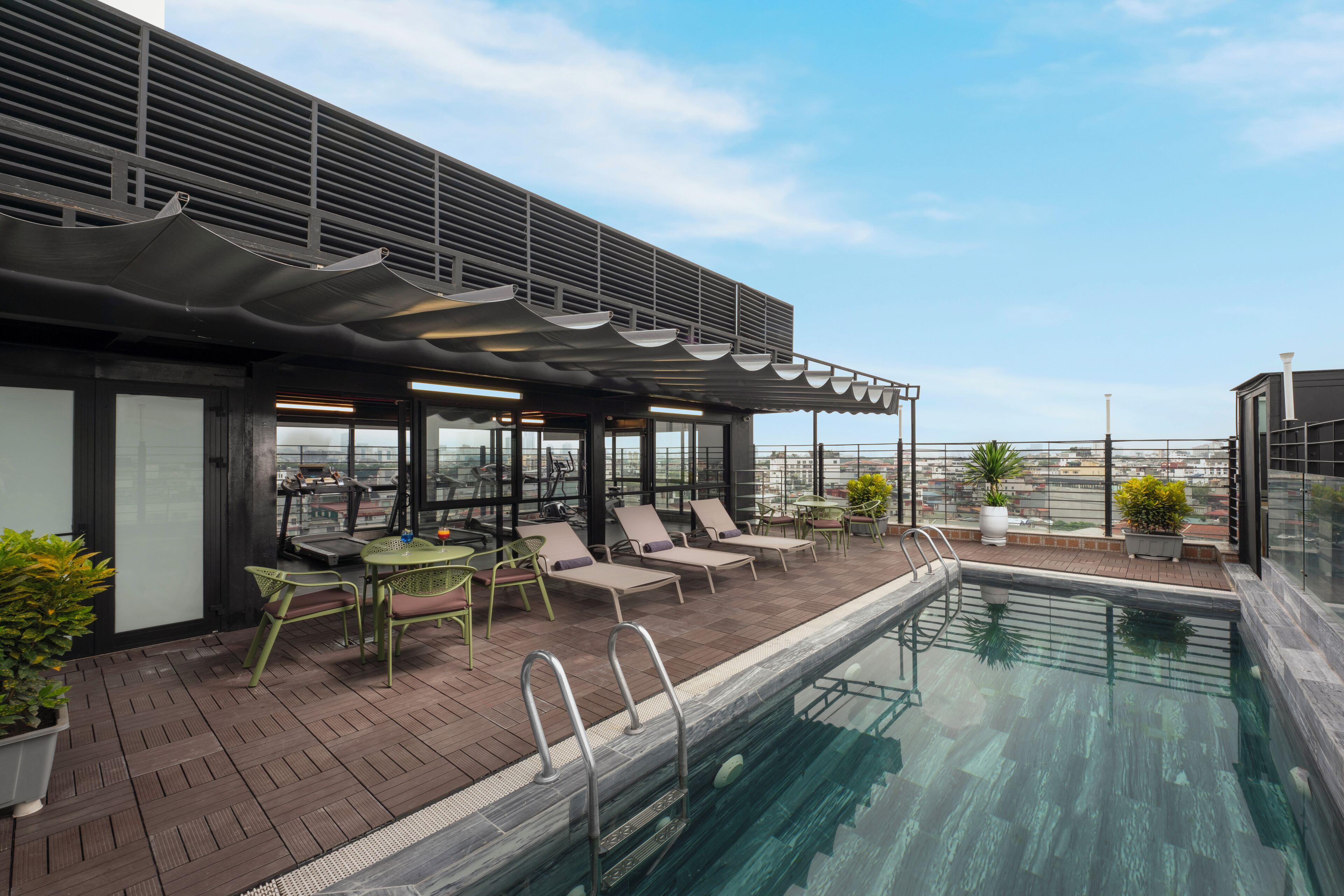 Outdoor pool, open 7:30 AM to 10 PM, pool loungers