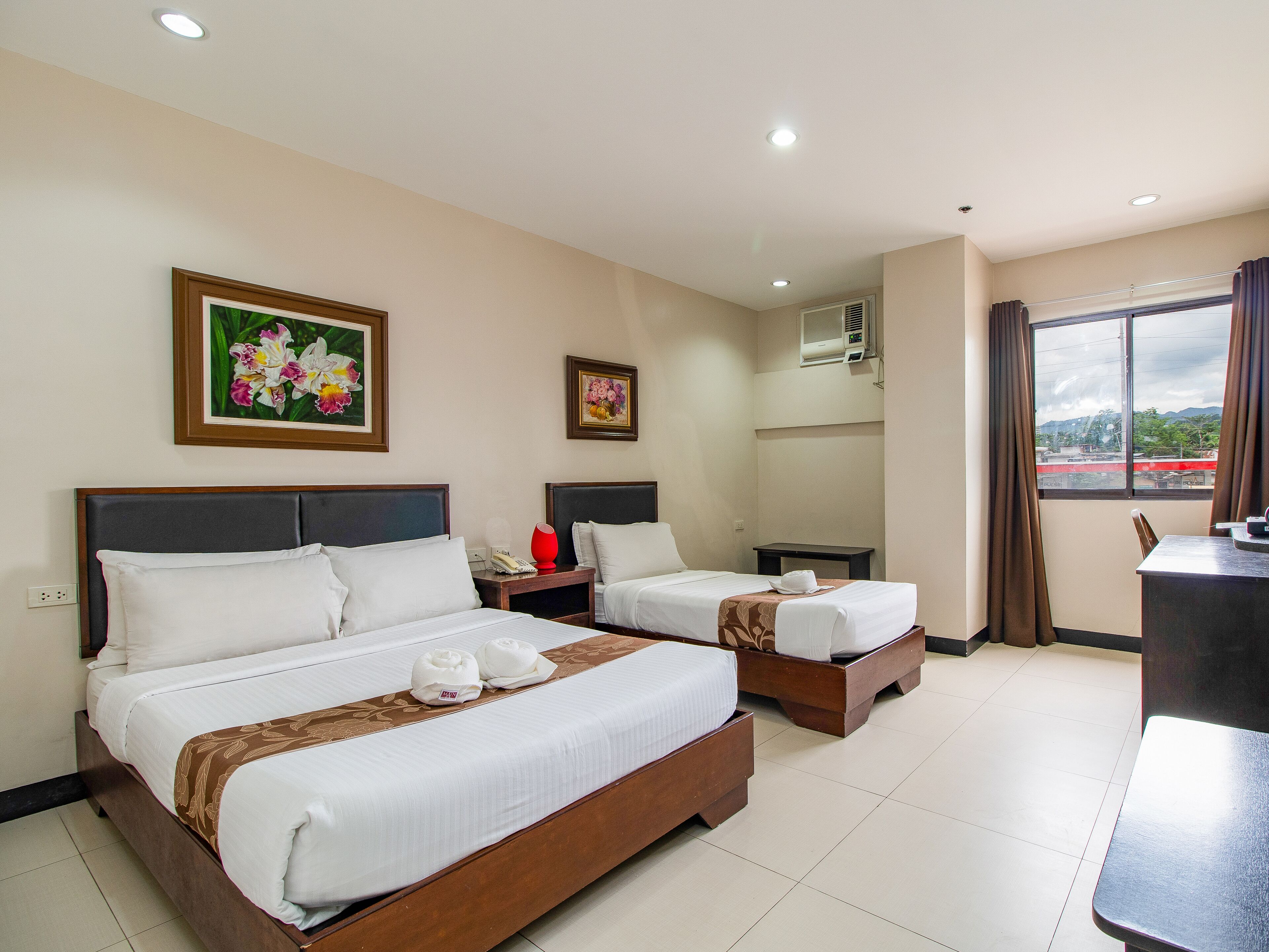 semi family room | down duvets, memory-foam beds, in-room safe, individually decorated