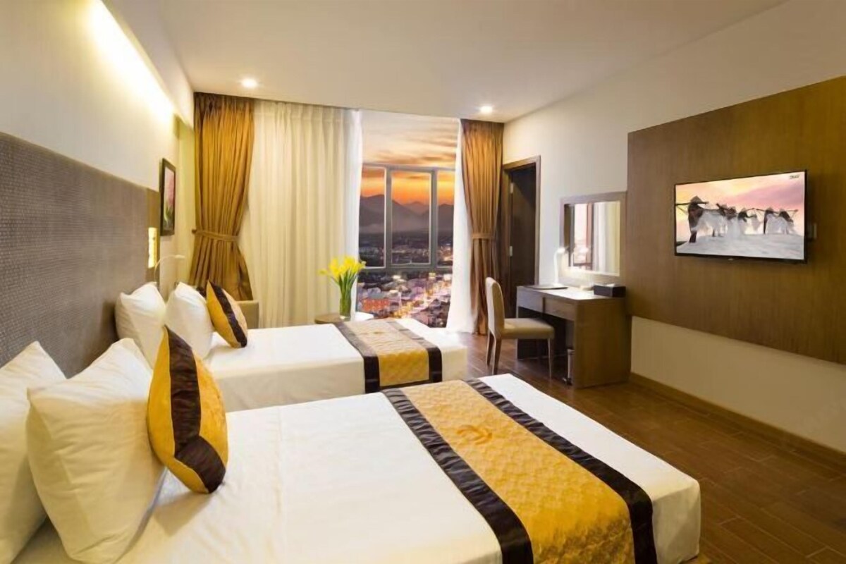 Luxe beddengoed, een minibar, een kluis op de kamer, een bureau