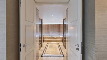Premier Suite | Bathroom | Separate bathtub and shower, designer toiletries, hair dryer, slippers