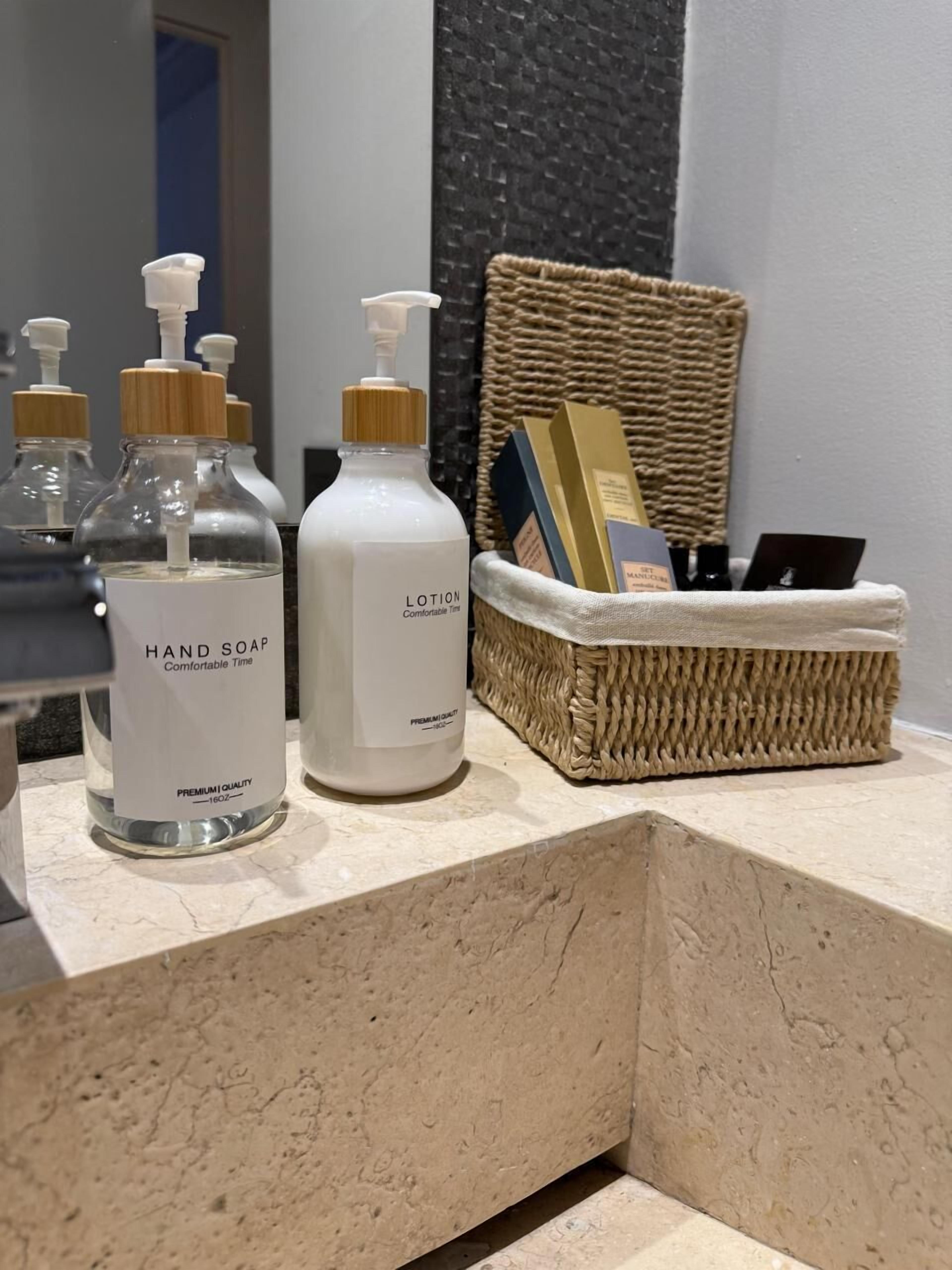 presidential suite | bathroom amenities | shower, rainfall showerhead, hair dryer, towels