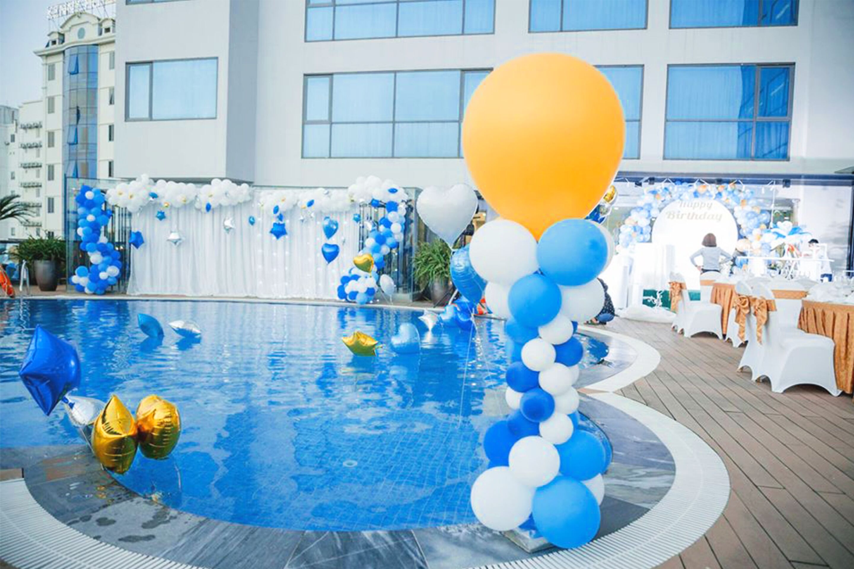 outdoor pool, pool umbrellas, pool loungers