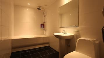 Shower, hair dryer, slippers, towels
