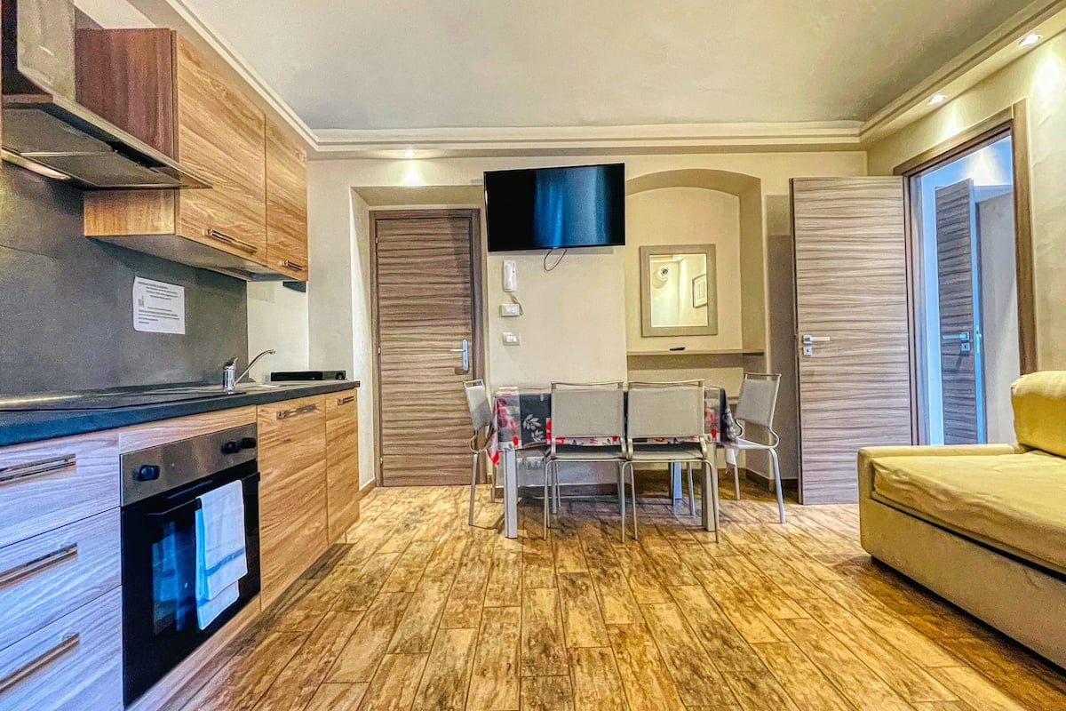 superior apartment, 1 bedroom, terrace (4 people) | living area | 70-cm flat-screen tv with digital channels, tv