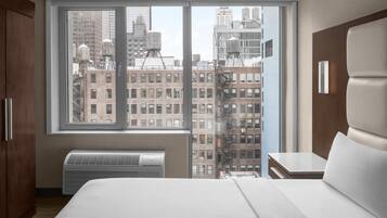 Deluxe Suite, 1 King Bed, Non Smoking, City View | In-room safe, desk, blackout drapes, iron/ironing board