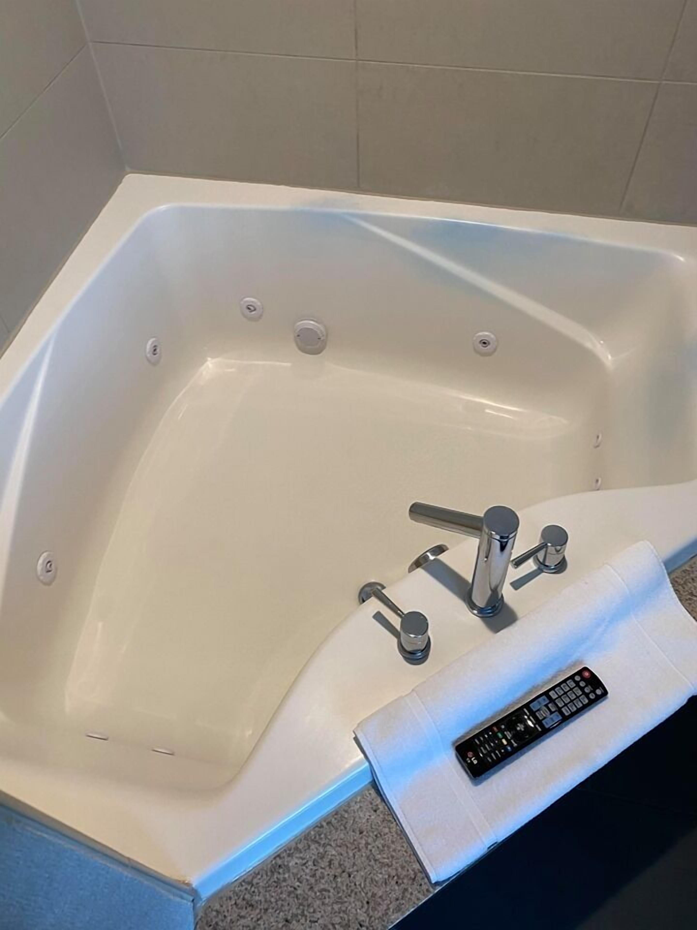 superior suite, 1 king bed, non smoking, hot tub | premium bedding, tempur-pedic beds, individually furnished, desk