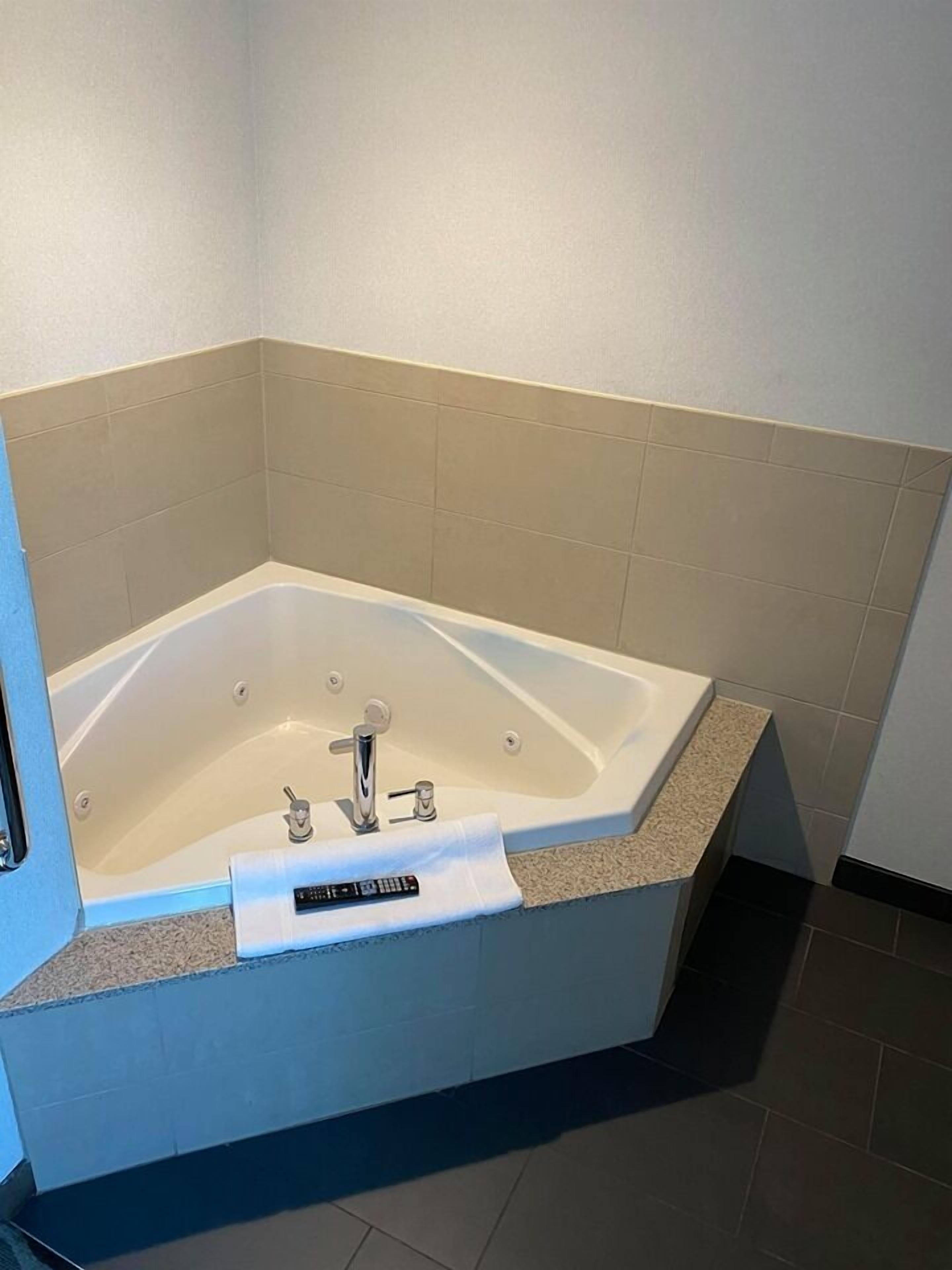 superior suite, 1 king bed, non smoking, hot tub | premium bedding, tempur-pedic beds, individually furnished, desk