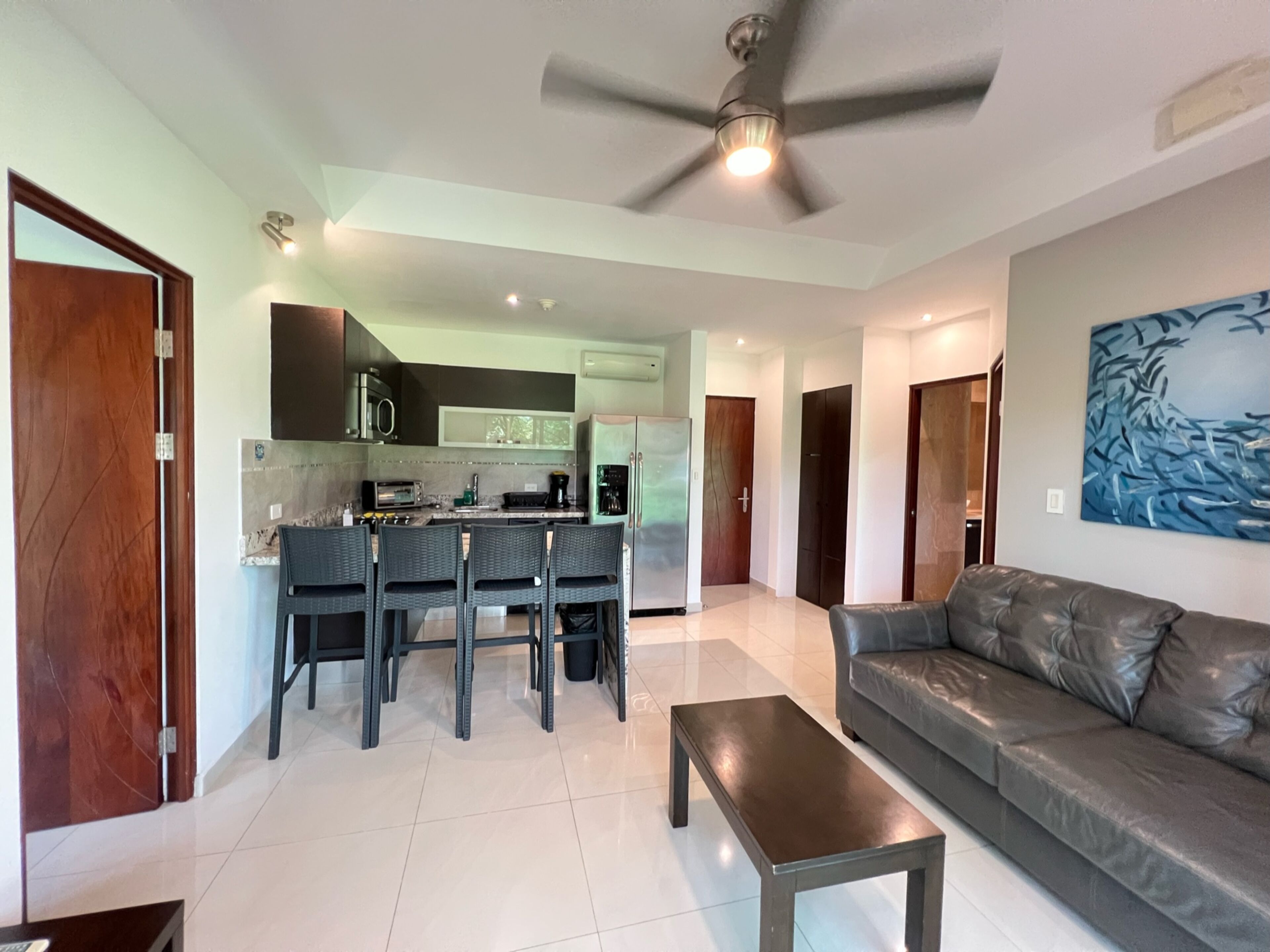 2br family suite w/kitchen, living room, 2 masters, 2 bath, 3 balconies | private kitchen | coffee/tea maker, high chair, eco-friendly cleaning products