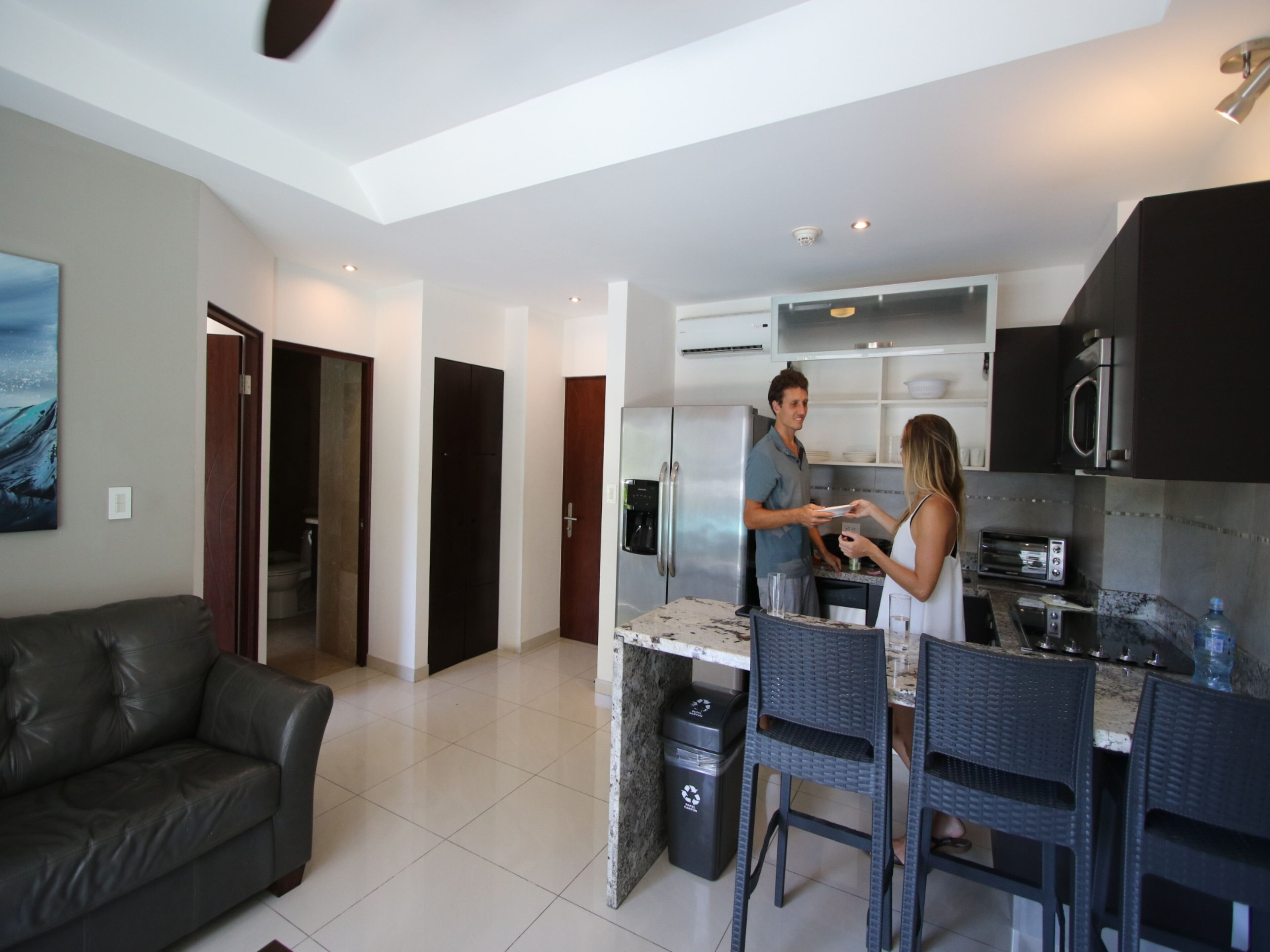 1br kitchen suite w/kitchen, living room, 2 balconies | private kitchen | coffee/tea maker, high chair, eco-friendly cleaning products