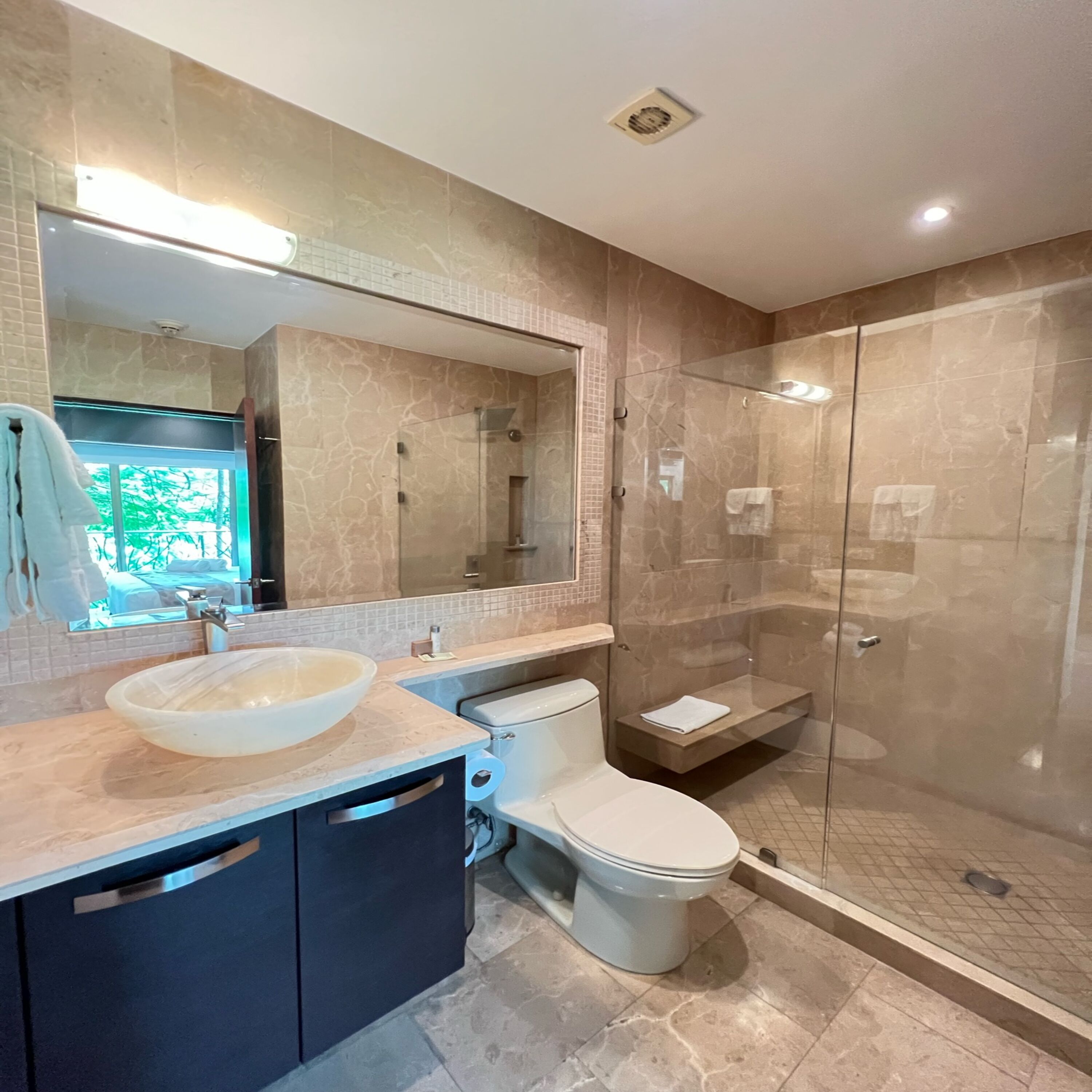 shower, eco-friendly toiletries, hair dryer, towels