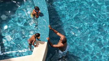 Outdoor pool, free pool cabanas, pool umbrellas