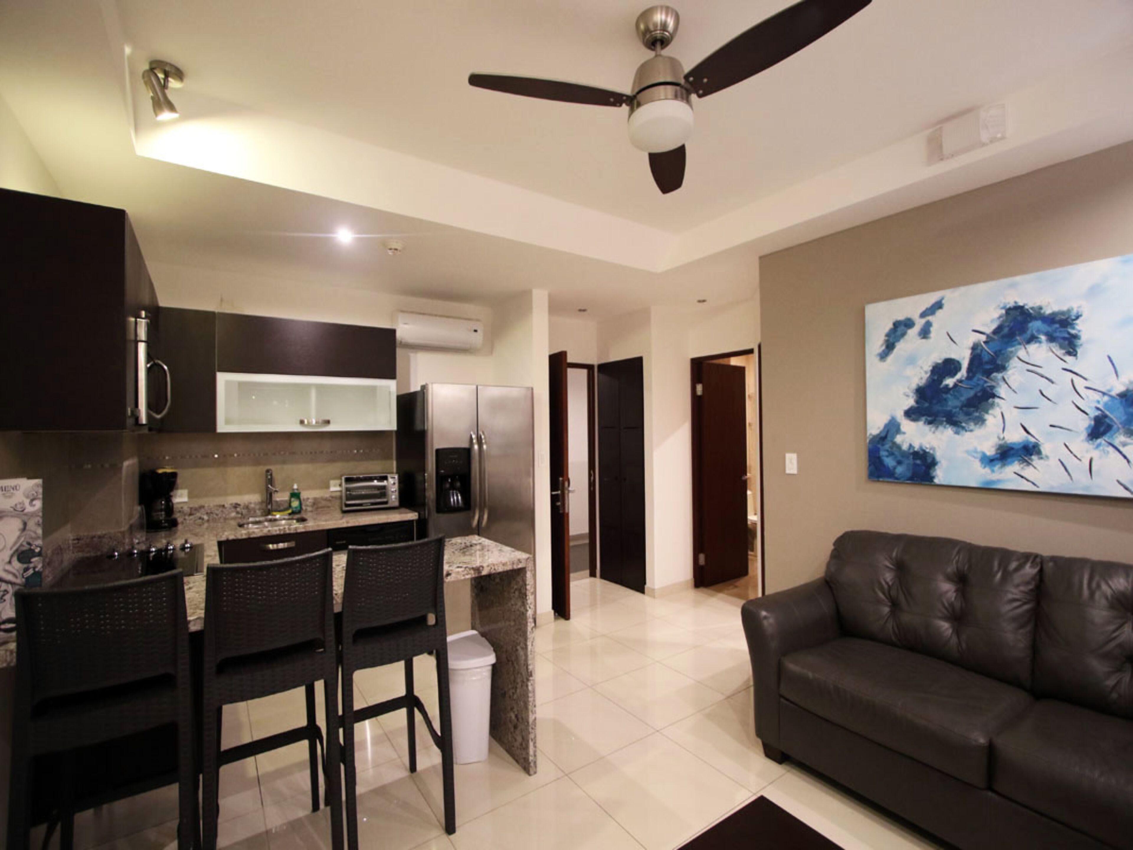 1br kitchen suite w/kitchen, living room, 2 balconies | private kitchen | coffee/tea maker, high chair, eco-friendly cleaning products