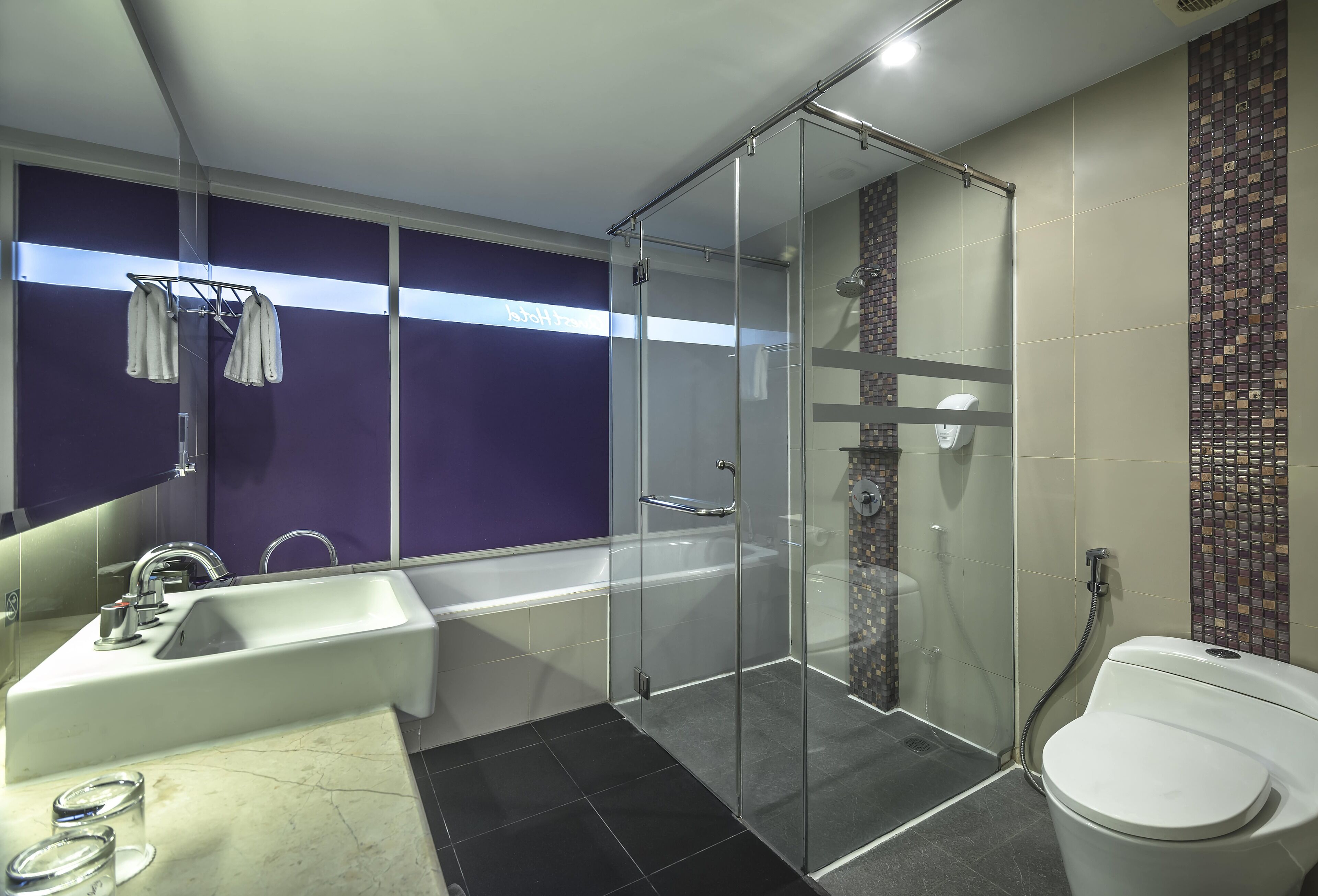 executive suite | bathroom | free toiletries, hair dryer, slippers, towels