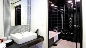 Suite, Smoking | Bathroom | Combined shower/tub, free toiletries, hair dryer, slippers