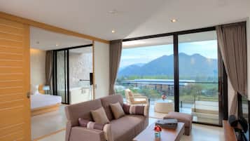 Botanica Suite | Living room | 32-inch LCD TV with satellite channels, TV, DVD player