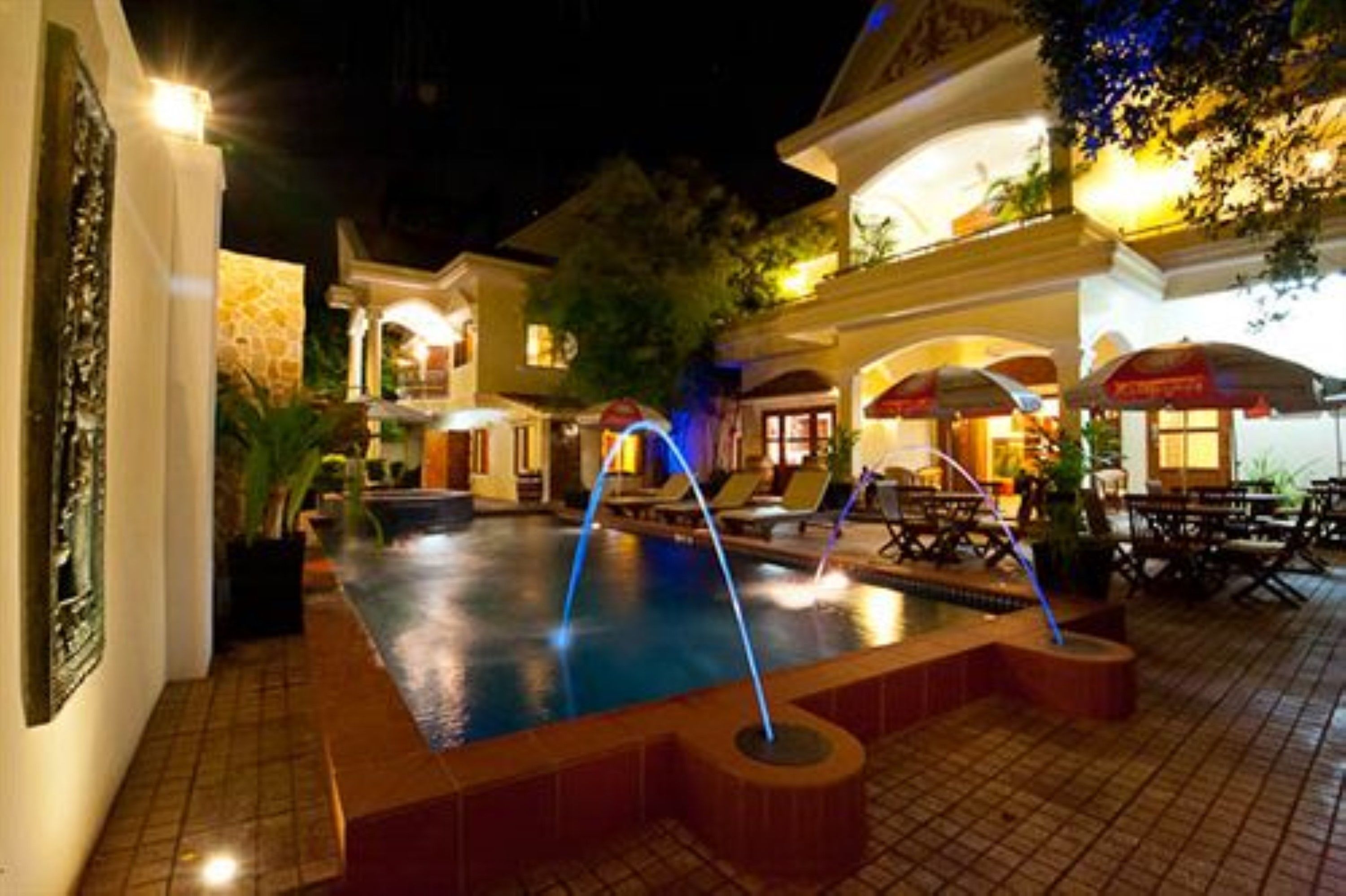 outdoor pool, pool umbrellas, pool loungers