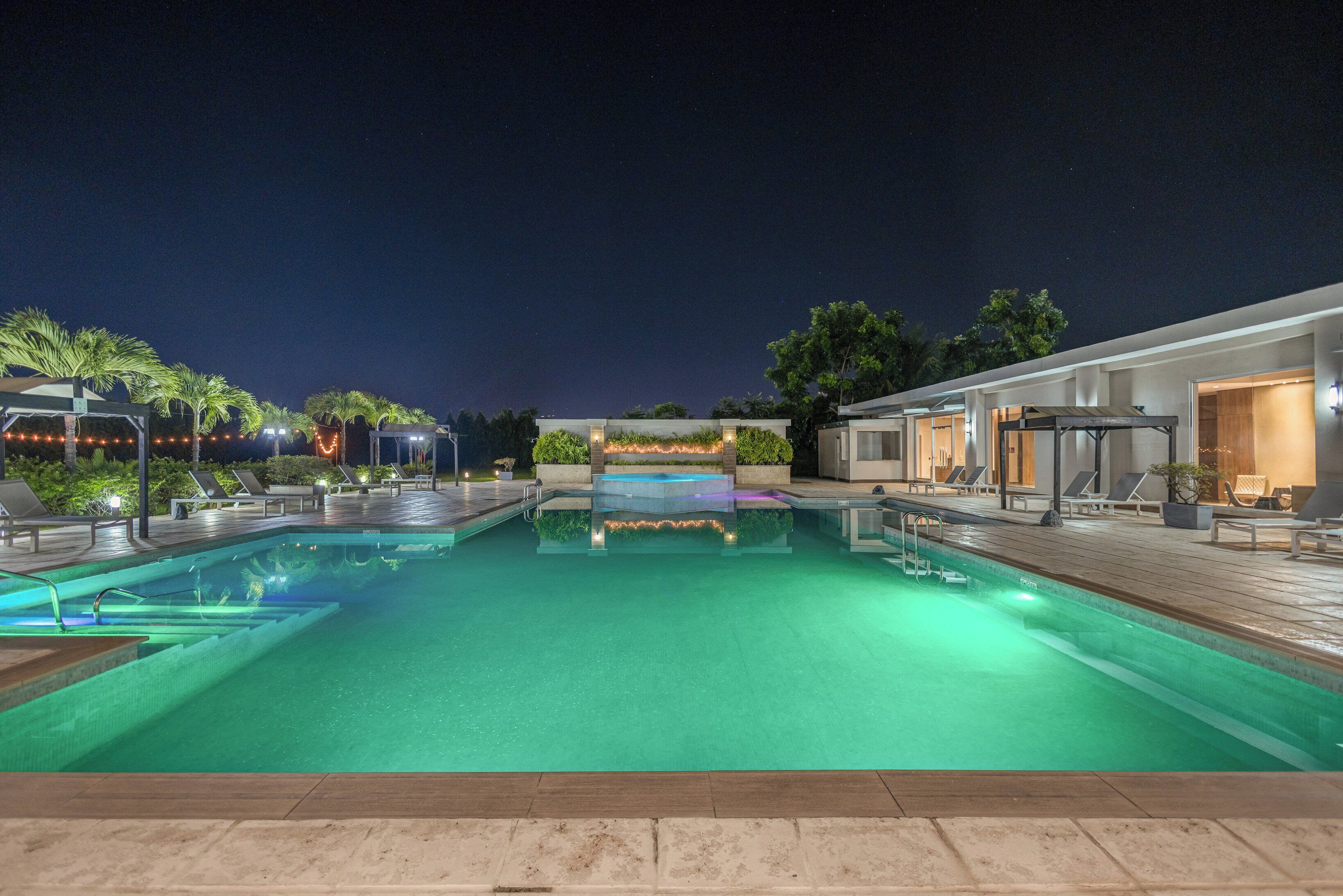 outdoor pool, pool umbrellas, pool loungers