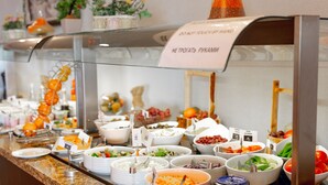 A buffet with various food options, including salads, fruits, and cheeses. - Shah Palace Luxury Museum Hotel (Baku)