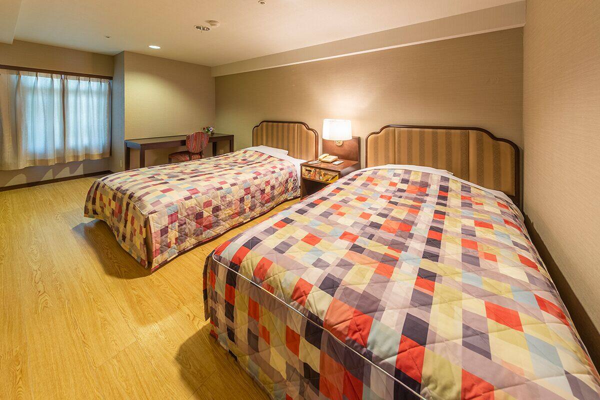 Standaard kamer, niet-roken (5-8F) | Een kluis op de kamer, een bureau, gratis wifi, individueel gedecoreerd