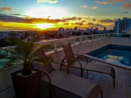 Outdoor pool, open 8 AM to 10 PM, pool umbrellas, sun loungers