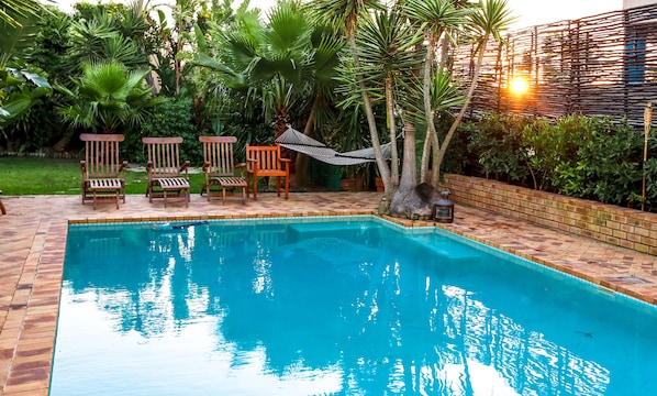 Outdoor pool, pool umbrellas, pool loungers