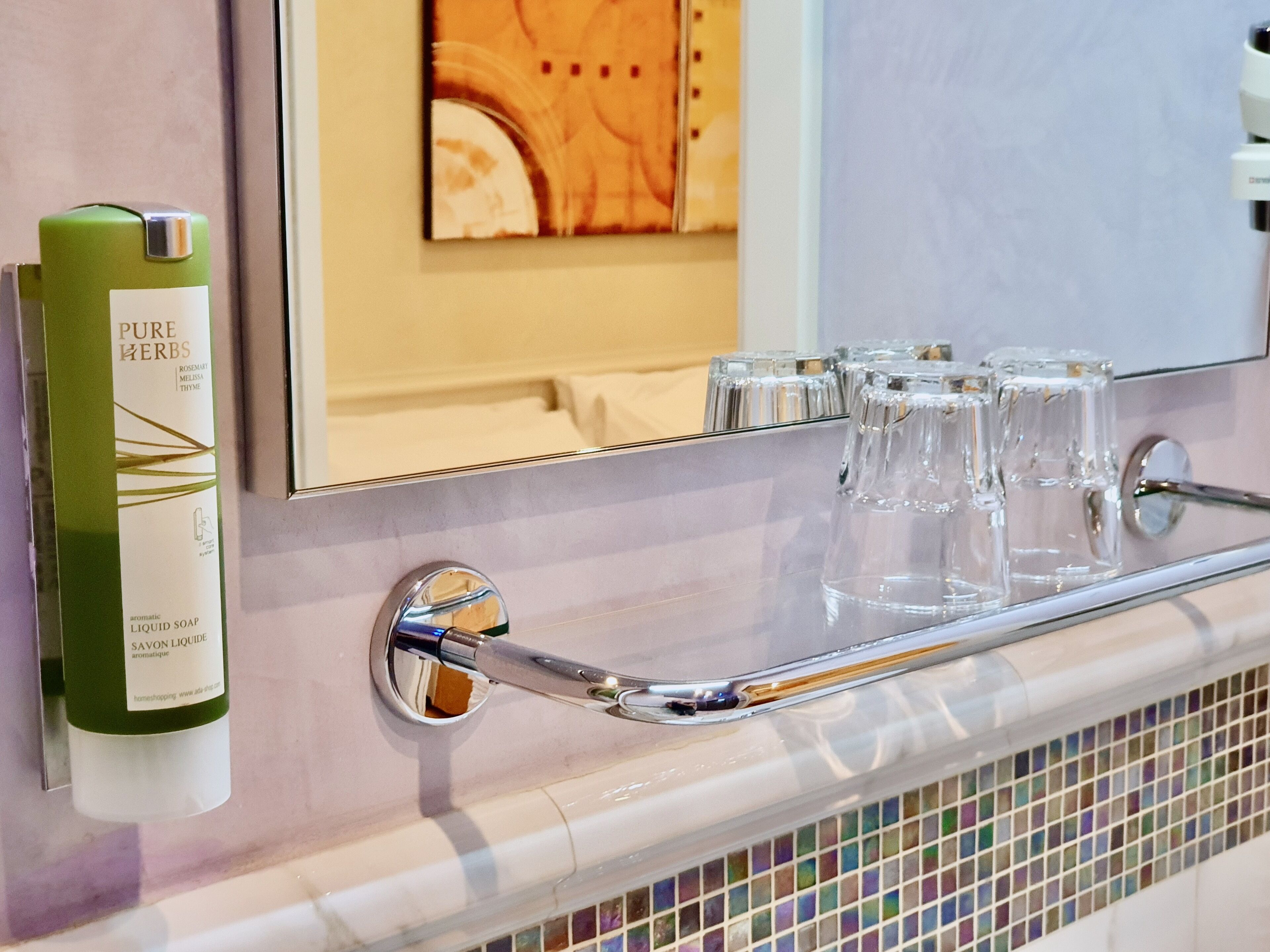 junior suite | bathroom | shower, free toiletries, hair dryer, slippers