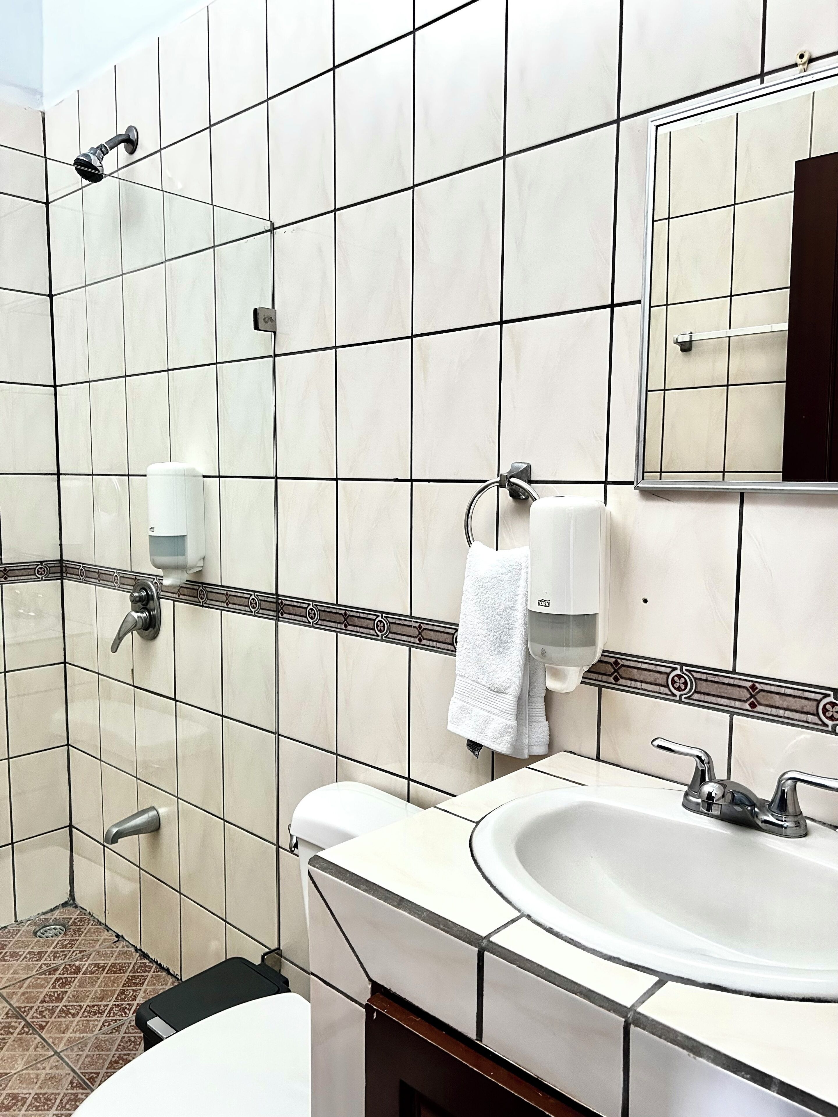 economy room | bathroom | free toiletries, hair dryer, towels, soap