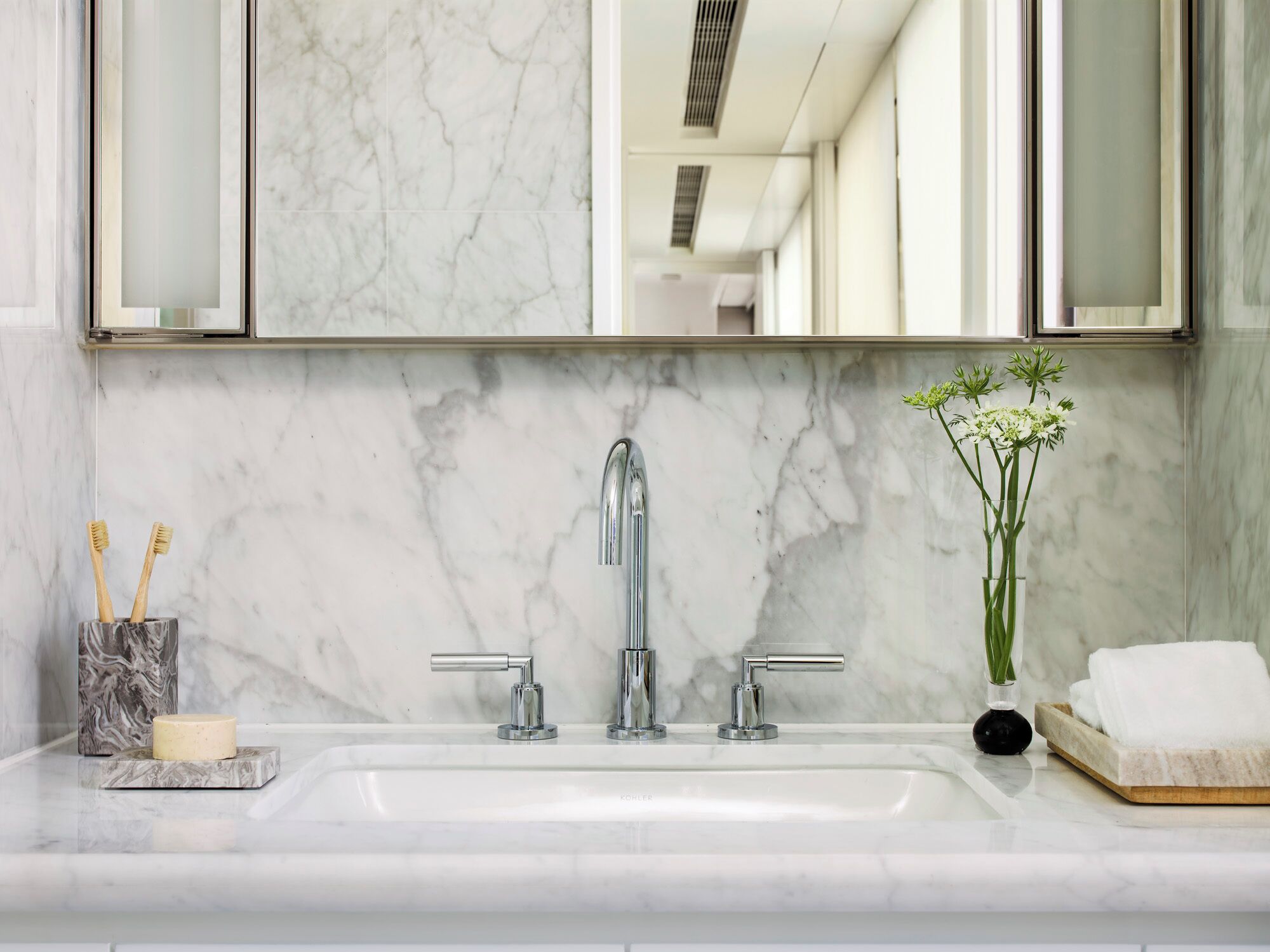 two-bedroom suite | bathroom | designer toiletries, hair dryer, slippers, towels