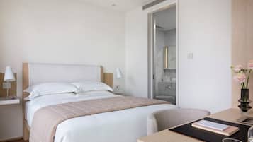 Frette Italian sheets, premium bedding, down duvets, in-room safe