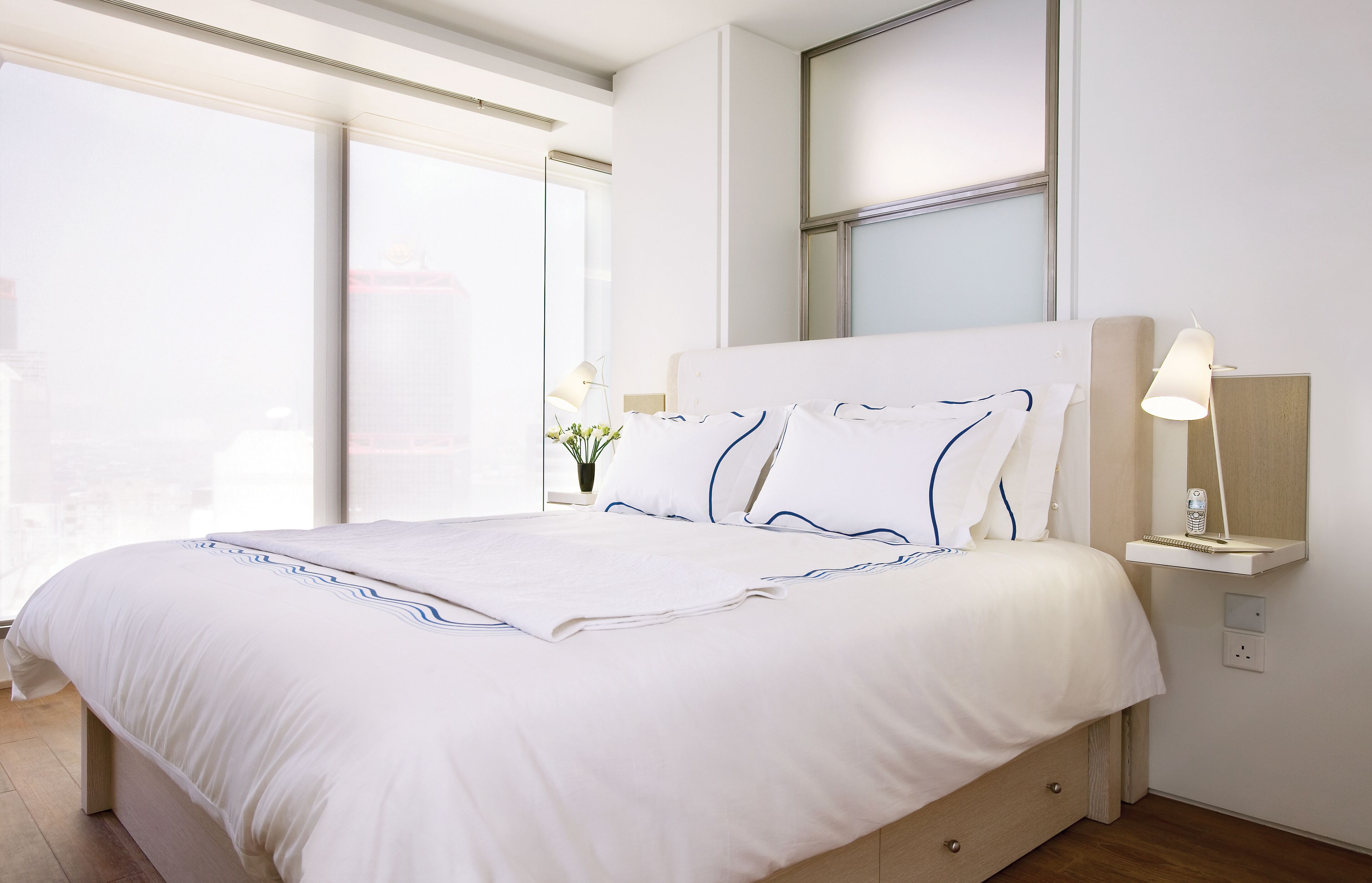 harbour & city view suite | frette italian sheets, premium bedding, down duvets, in-room safe
