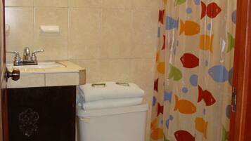 Standard Room, 2 Double Beds, Ground Floor | Bathroom | Shower, free toiletries, hair dryer, towels