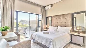 Luxury Apartment, 3 Bedrooms, Air conditioning, City View | Premium bedding, in-room safe, blackout drapes, soundproofing