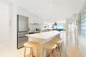 Deluxe Apartment | Private kitchen | Full-sized fridge, microwave, oven, stovetop - La Mer Noosa (Noosa Heads)