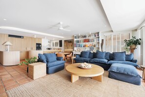 Exclusive Apartment | Living area | 42-inch flat-screen TV with cable channels, LED TV, DVD player - La Mer Noosa (Noosa Heads)