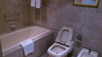 Standard Suite, 1 Bedroom | Bathroom | Separate bathtub and shower, deep-soaking bathtub, free toiletries