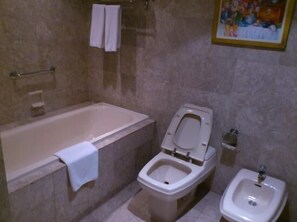 Standard Suite, 1 Bedroom | Bathroom | Separate tub and shower, deep soaking tub, free toiletries, hair dryer - Excellent Service Suites at Times Square (Kuala Lumpur)