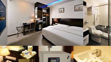 Une chambre d’hôtel comprenant un lit, un bureau, une chaise et une salle de bain avec douche et toilettes.