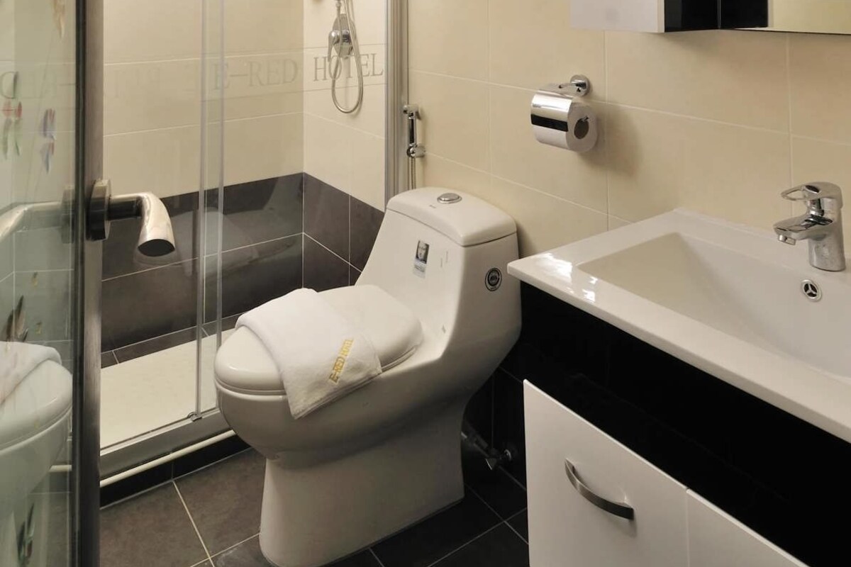 Bathroom | Free toiletries, hair dryer (on request), slippers, towels