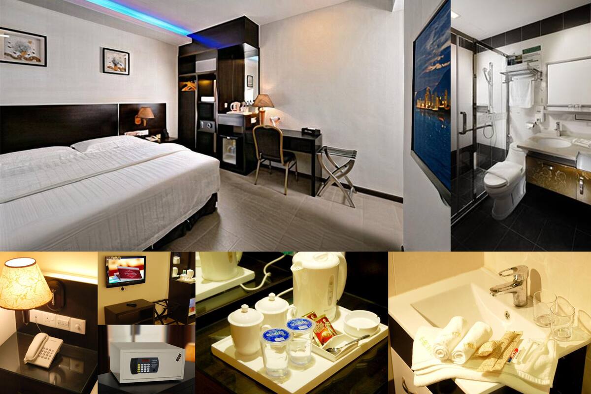Deluxe Queen Room | In-room safe, blackout drapes, iron/ironing board (on request)