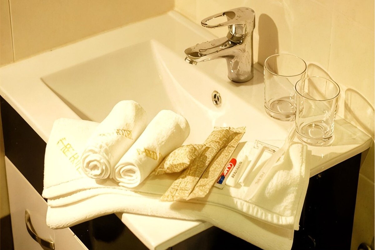 Bathroom | Free toiletries, hair dryer (on request), slippers, towels