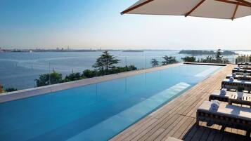 3 outdoor pools, open 9 AM to 8 PM, cabanas (surcharge), pool umbrellas
