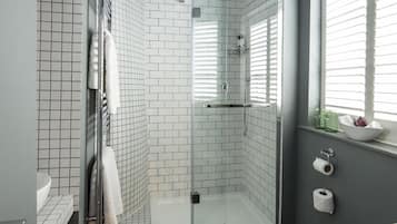 Shower, rainfall showerhead, designer toiletries, hair dryer