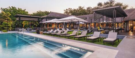 Outdoor pool, pool umbrellas, sun loungers