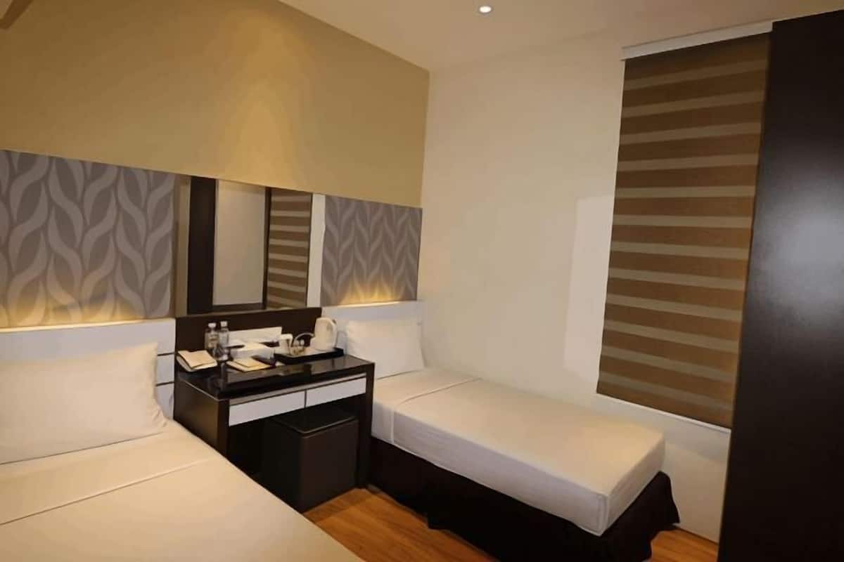 Minibar, bureau, chambres insonorisées, fer et planche à repasser