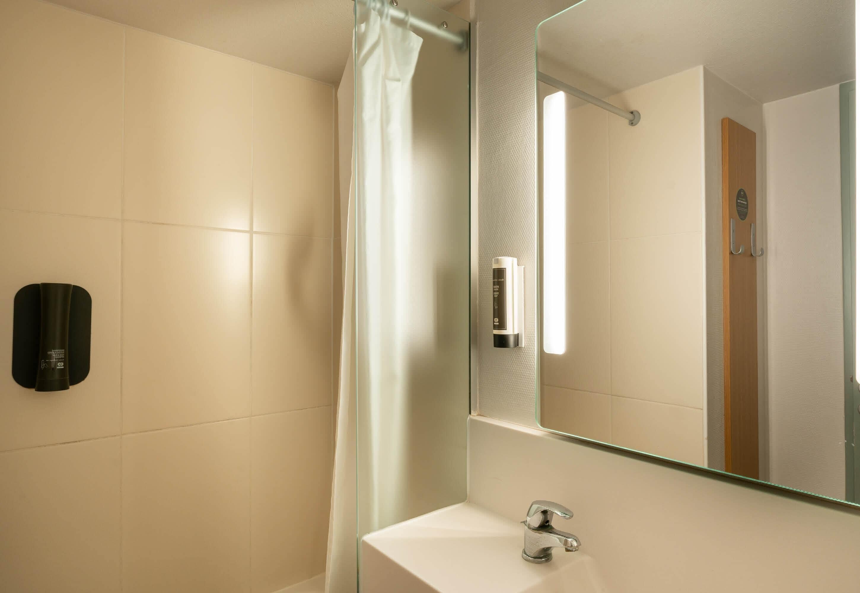 Shower, hair dryer (on request), towels