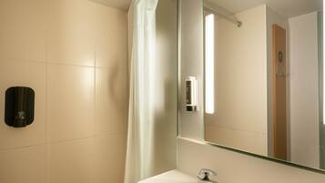Shower, hair dryer (on request), towels