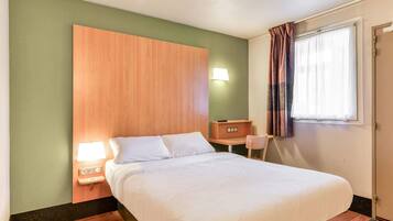 Premium bedding, desk, blackout curtains, soundproofing