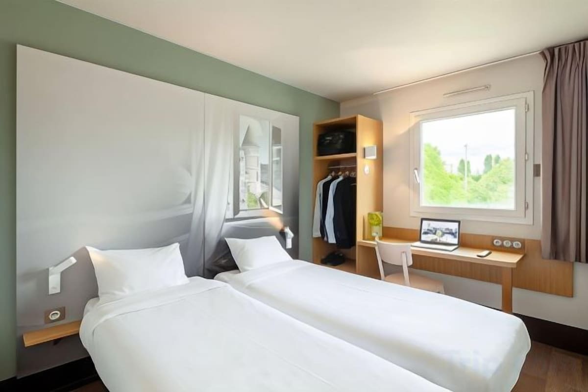 Premium bedding, down comforters, desk, soundproofing