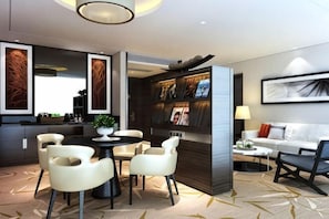 A modern hotel room with a dining area, a sofa, a bookshelf, and a large window. - Hebei Huibin Hotel (Shijiazhuang)