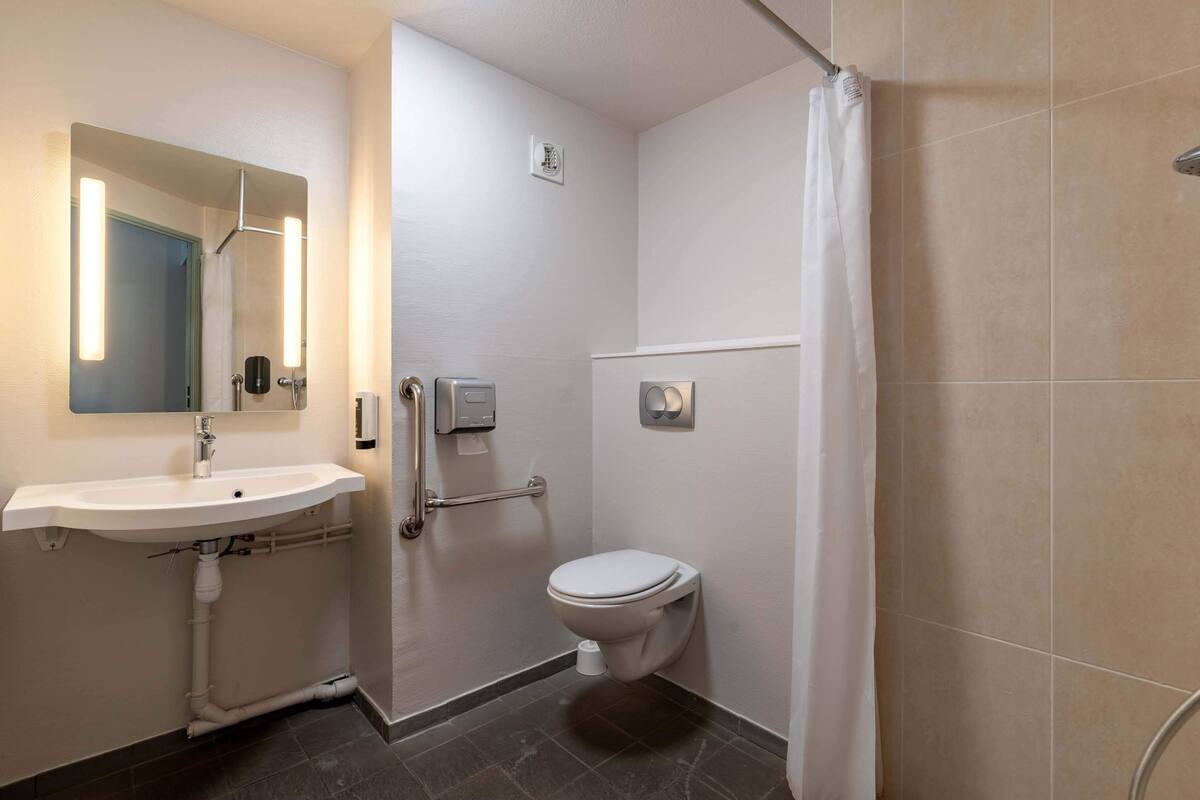 double room, accessible | bathroom | shower, hair dryer, towels, soap